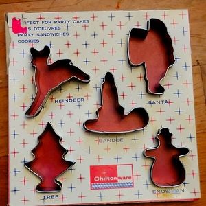 A package of 5 cookle cutters. Chilton ware, cutters about 3", silver metal